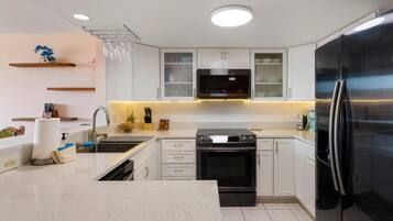 Condo, 2 Bedrooms | Private kitchen | Fridge, oven, coffee/tea maker, toaster