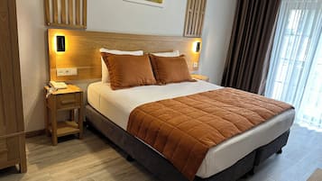 Chambre Confort Double ou avec lits jumeaux | Literie de qualité supérieure, couette en duvet d'oie