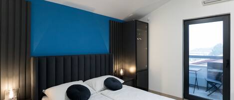 Chambre panoramique double | SystĂšme dâinsonorisation, accĂšs au Wi-Fi (inclus), literie fournie