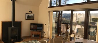 Beautiful cabin with log burner, wood fired hot tub and stunning views.