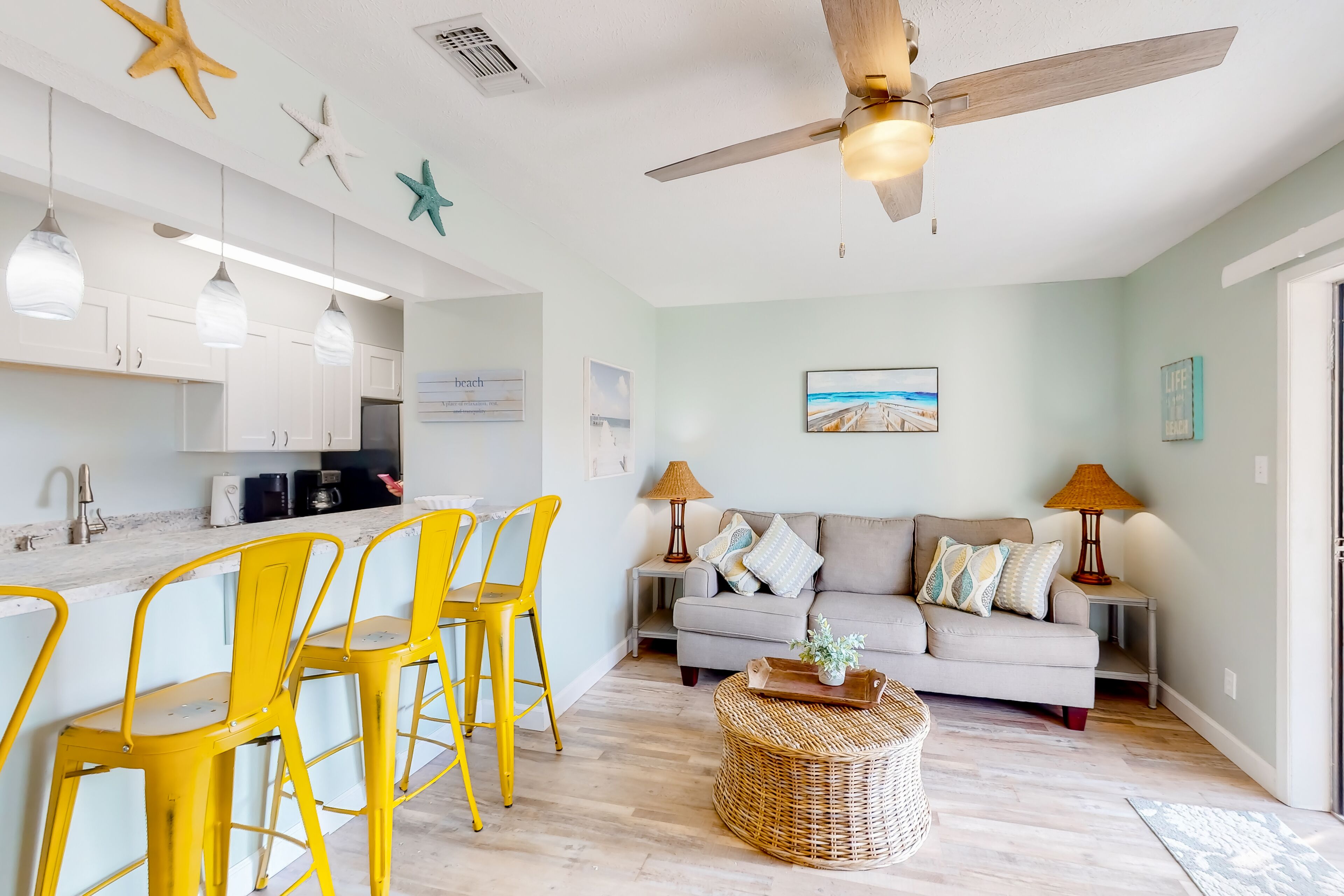 Updated, ground-floor condo steps from the beach with pools & hot tub