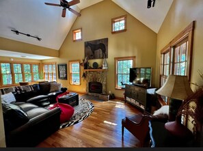 Smart TV, fireplace, foosball, books