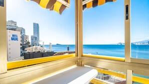 A balcony with a view of the sea and cityscape, including Hotel Nadal. - Don Miguel Apartment 8-C Levante Beach (Benidorm)