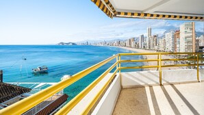 A balcony with a view of a beach and cityscape. - Don Miguel Apartment 8-C Levante Beach (Benidorm)