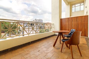 In-room safe, desk, laptop workspace, iron/ironing board - DALLAS PREMIERE HOTEL (Kisii)