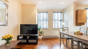 Deluxe Apartment | Living area | 42-inch Smart TV with digital channels, TV