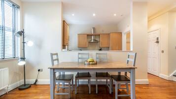 Deluxe Apartment | Living area | 42-inch Smart TV with digital channels, TV