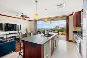 Condo, Multiple Beds, Balcony, Ocean View (Hale Kai) | Private kitchen | Fridge, microwave, oven, stovetop