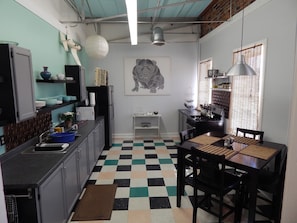 Apartment A: Retro Hipster | Private kitchen | Fridge, microwave, oven, stovetop - Salisbury Riverfront Lofts (Salisbury)
