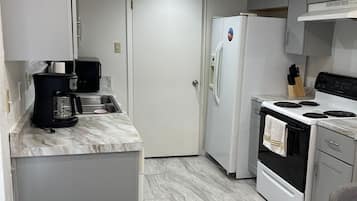 Een magnetron, een oven, een kookplaat