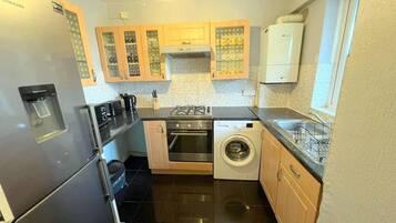 Apartment | Private kitchen | Fridge, microwave, oven, stovetop