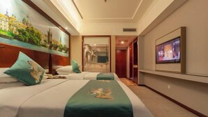 A hotel room with two beds, a large mirror, a television, and a painting of a cityscape. - Vienna Hotel ( Hunan Zhangjiajie City Park ) (Zhangjiajie)