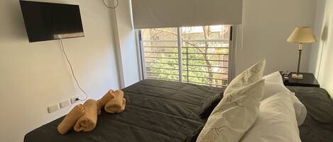 2 dormitorios, tabla de planchar con plancha, wifi gratis y ropa de cama