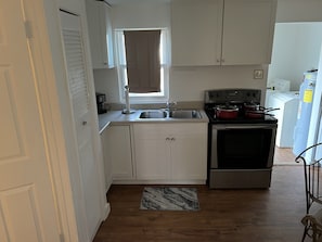 Fridge, oven, coffee/tea maker, toaster