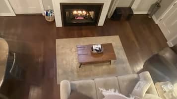 Smart TV, fireplace, books