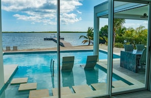 Outdoor pool, a heated pool, pool loungers