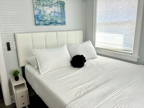 2 عدّة غرف نوم ومكواة/لوح كي وواي فاي مجانًا وملاءات أسرّة