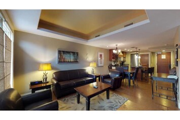 Open concept  living room, dining and kitchen area. 