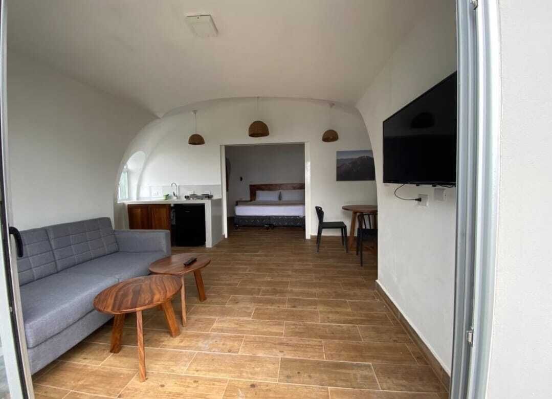 コンフォート スタジオスイート ベッド (複数台) ガーデンビュー (Igloo Suite 9) | リビングルーム