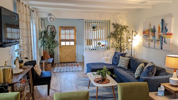 A living room with a sofa, chairs, a coffee table, and a TV. - Extended Stay! 2 Bedroom/1 bath/Sleeps 6 (Vista)