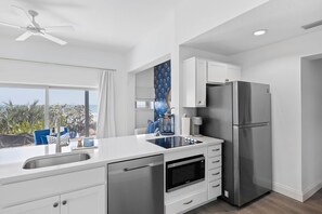 Fridge, microwave, coffee/tea maker, toaster