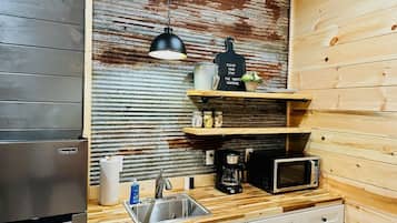 Fridge, microwave, coffee/tea maker, toaster