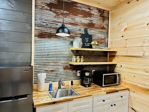 Fridge, microwave, coffee/tea maker, toaster