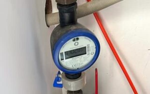 A digital water meter attached to a pipe. - 4 Star Holiday Home in Skagen (Skagen)