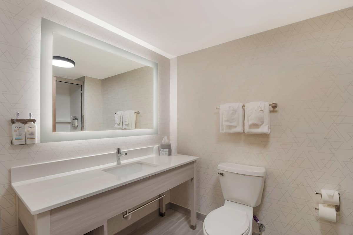 Shower, hydromassage showerhead, hair dryer, towels