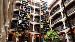 A multi-level atrium with numerous display shelves and columns.