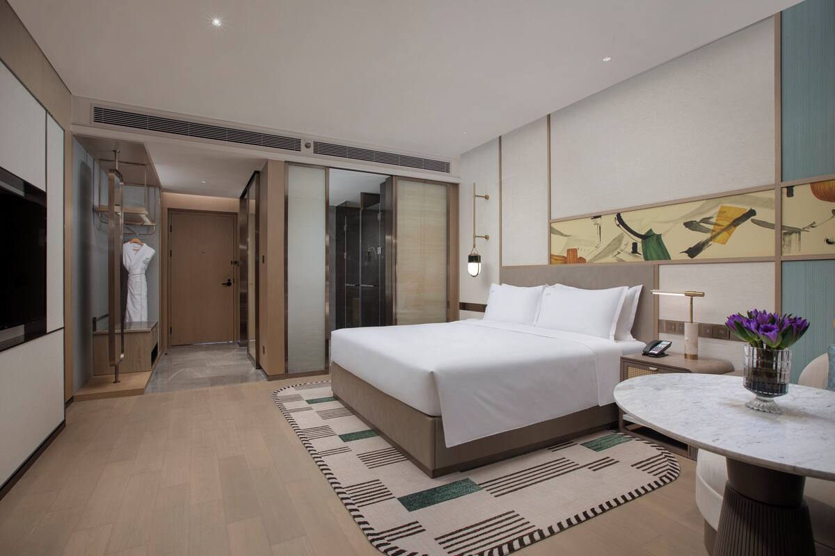 Egyptian cotton sheets, premium bedding, down duvets, memory-foam beds