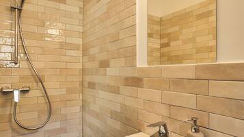 Shower, towels, toilet paper