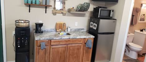 Fridge, microwave, coffee/tea maker, toaster