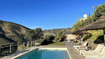 Seasonal outdoor pool, pool umbrellas, pool loungers