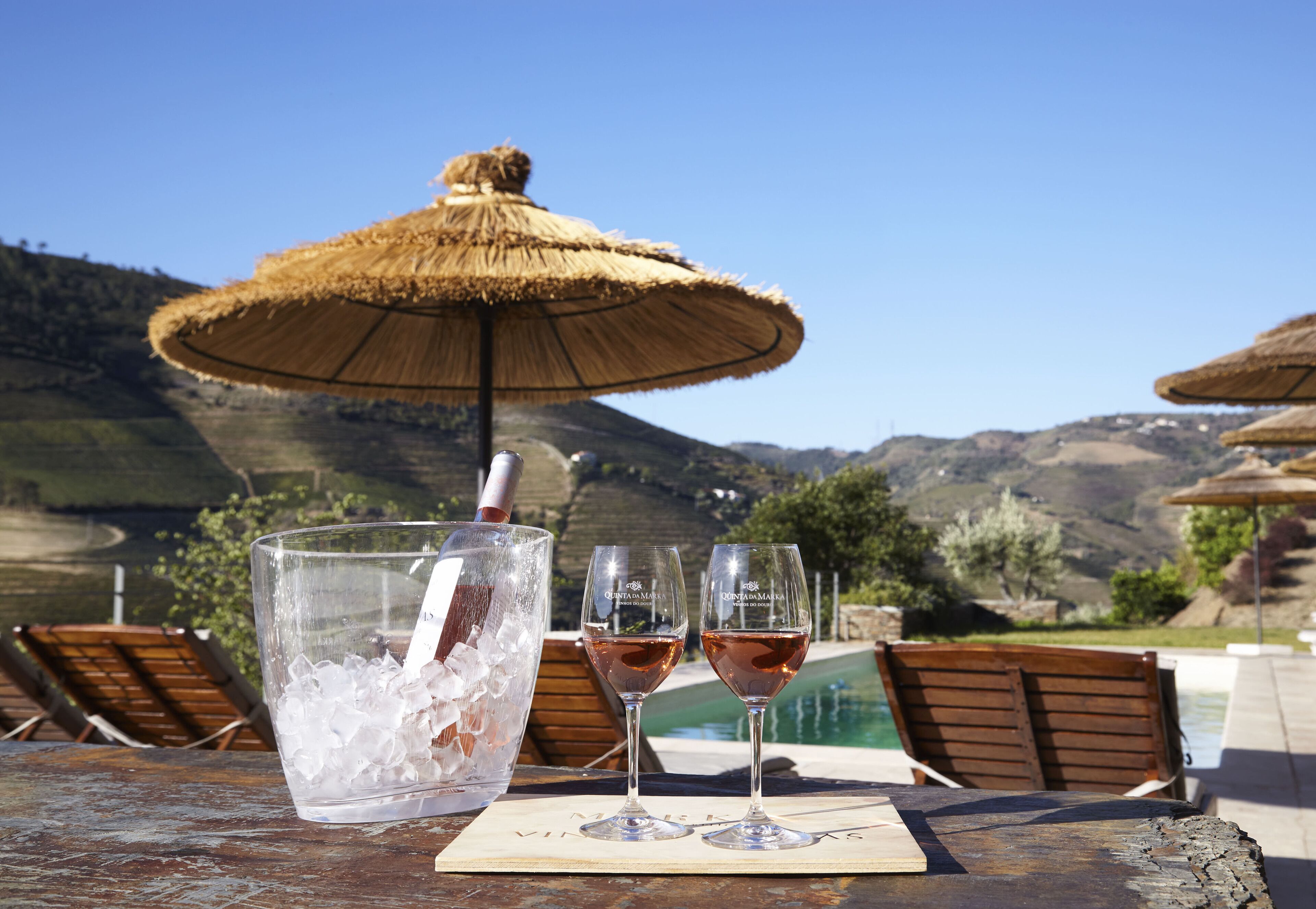 Seasonal outdoor pool, pool umbrellas, pool loungers