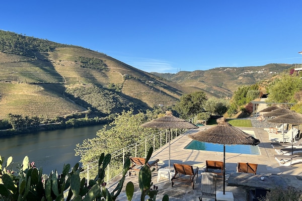 Seasonal outdoor pool, pool umbrellas, pool loungers