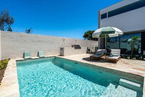 Outdoor pool, a heated pool - Reef House - Luxury Beachfront - Near Wineries (Aldinga Beach)