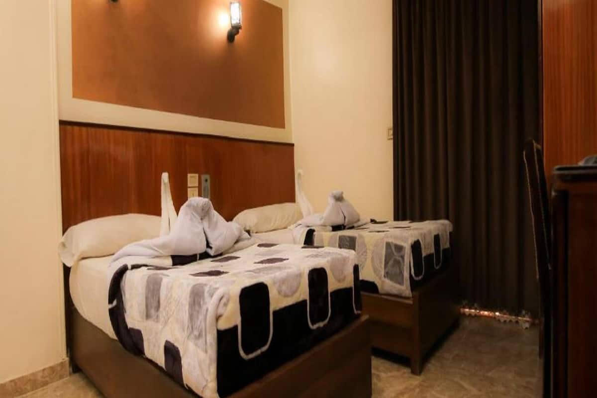 economy twin room | 1 bedroom, egyptian cotton sheets, premium bedding, memory-foam beds