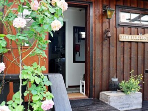 A wooden building entrance with a sign reading "HIMMELBERG." - 3 Person Holiday Home in Mellerud-by Traum (Mellerud)