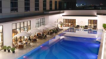 Outdoor pool, open 6:30 AM to 11:00 PM, sun loungers