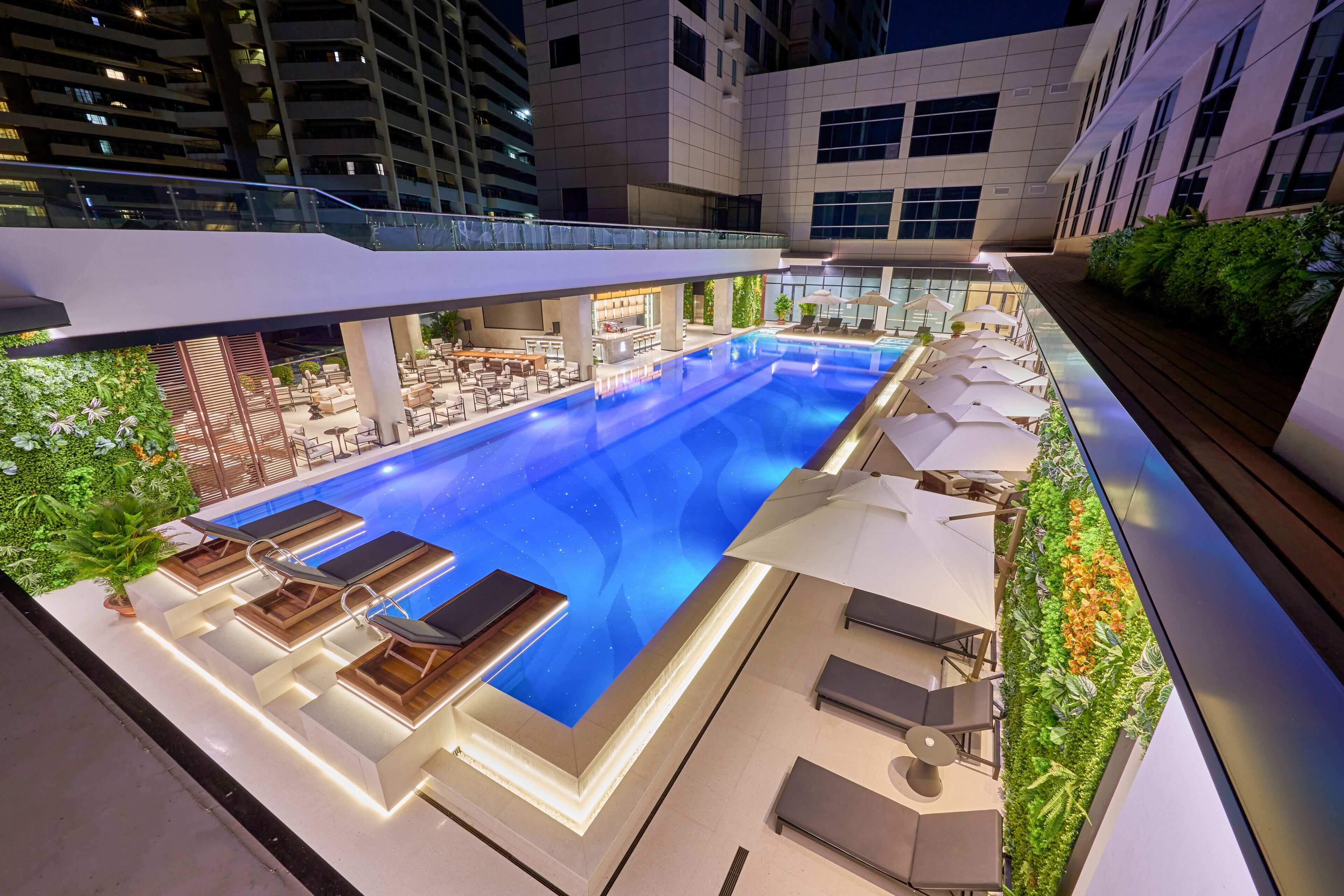 Outdoor pool, open 6:30 AM to 11:00 PM, pool loungers