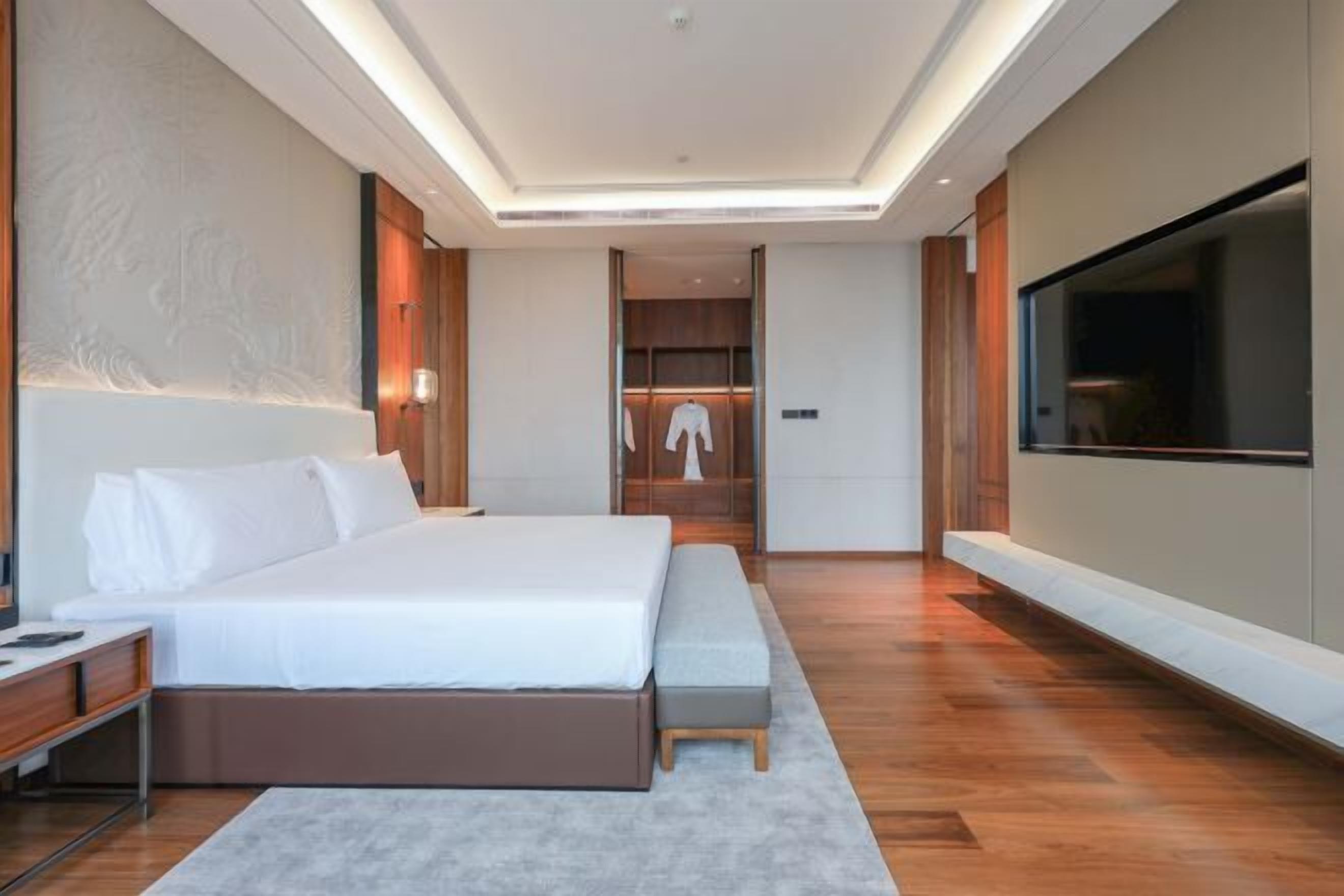 Premium bedding, down comforters, pillowtop beds, minibar