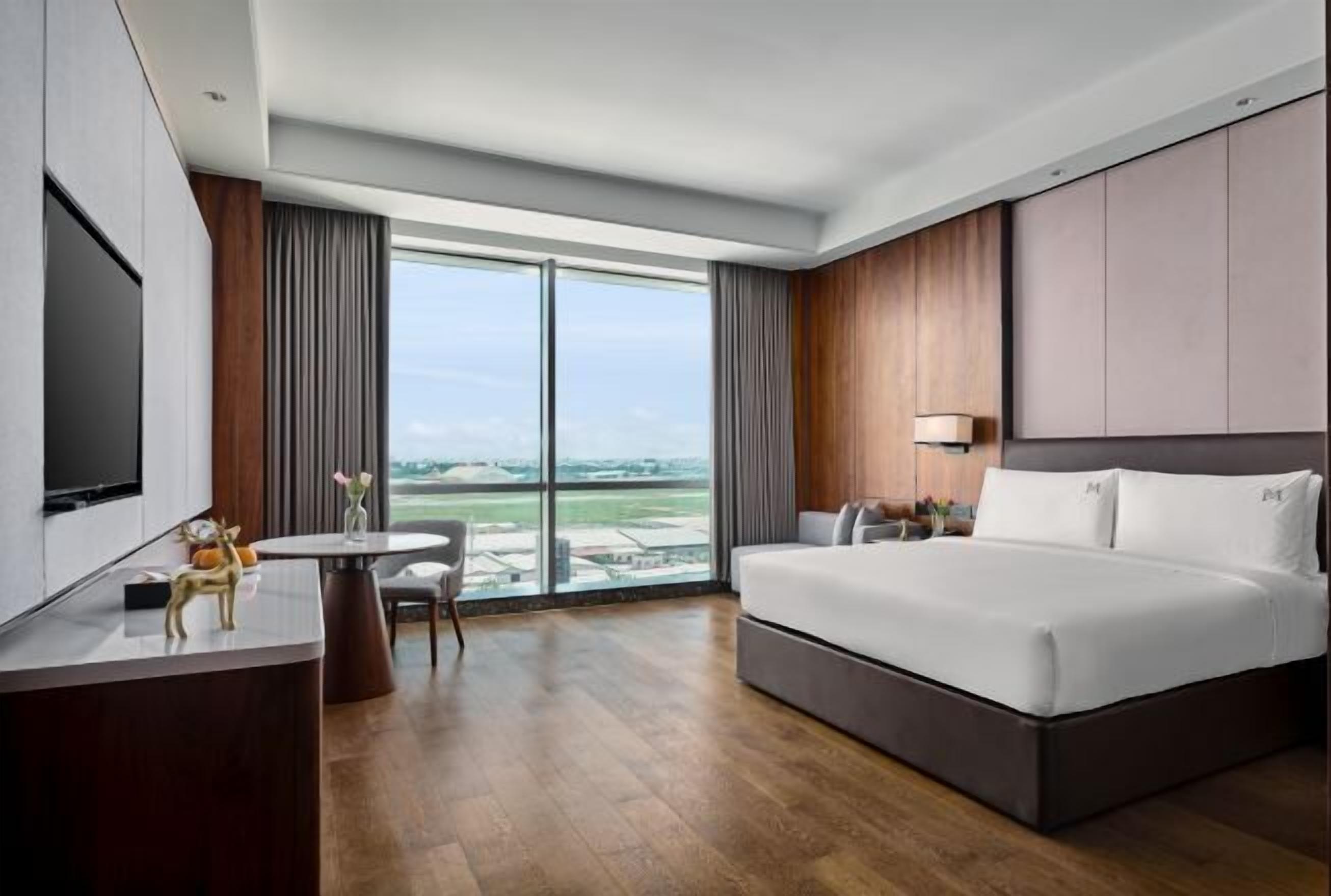 Premium bedding, down comforters, pillowtop beds, minibar