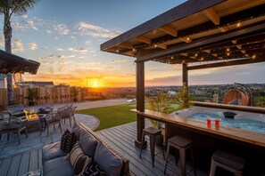 A patio area with a fire pit, outdoor seating, and a hot tub. - San Diego * Jacuzzi * Backyard Paradise (San Diego)