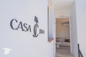 A hotel entrance with a sign reading 'CASA JUJO' and a palm tree symbol. - CostaBlancaDreams - Casa Juleo in Benissa (Benissa)