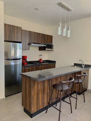 Fridge, microwave, stovetop, coffee/tea maker - NEW! Ample Condo- Walk to Beach! AMAZING Location! Everything Walk-in distance! (Mazatlán)