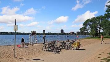 Enjoy a serene lakeside retreat with access to a sandy beach and scenic views.