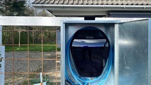 An outdoor electrical box with a blue cable connected to it. - 4 Star Holiday Home in Juelsminde (Horsens)