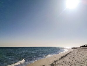 A beach with a clear sky and calm sea. - 4 Star Holiday Home in Otterup (Otterup)