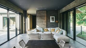 Luxury Villa | Living area | 59-inch TV with digital channels